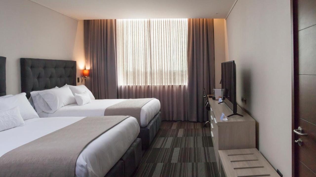Mds Hotel Chillan Ngoại thất bức ảnh A room at the hotel