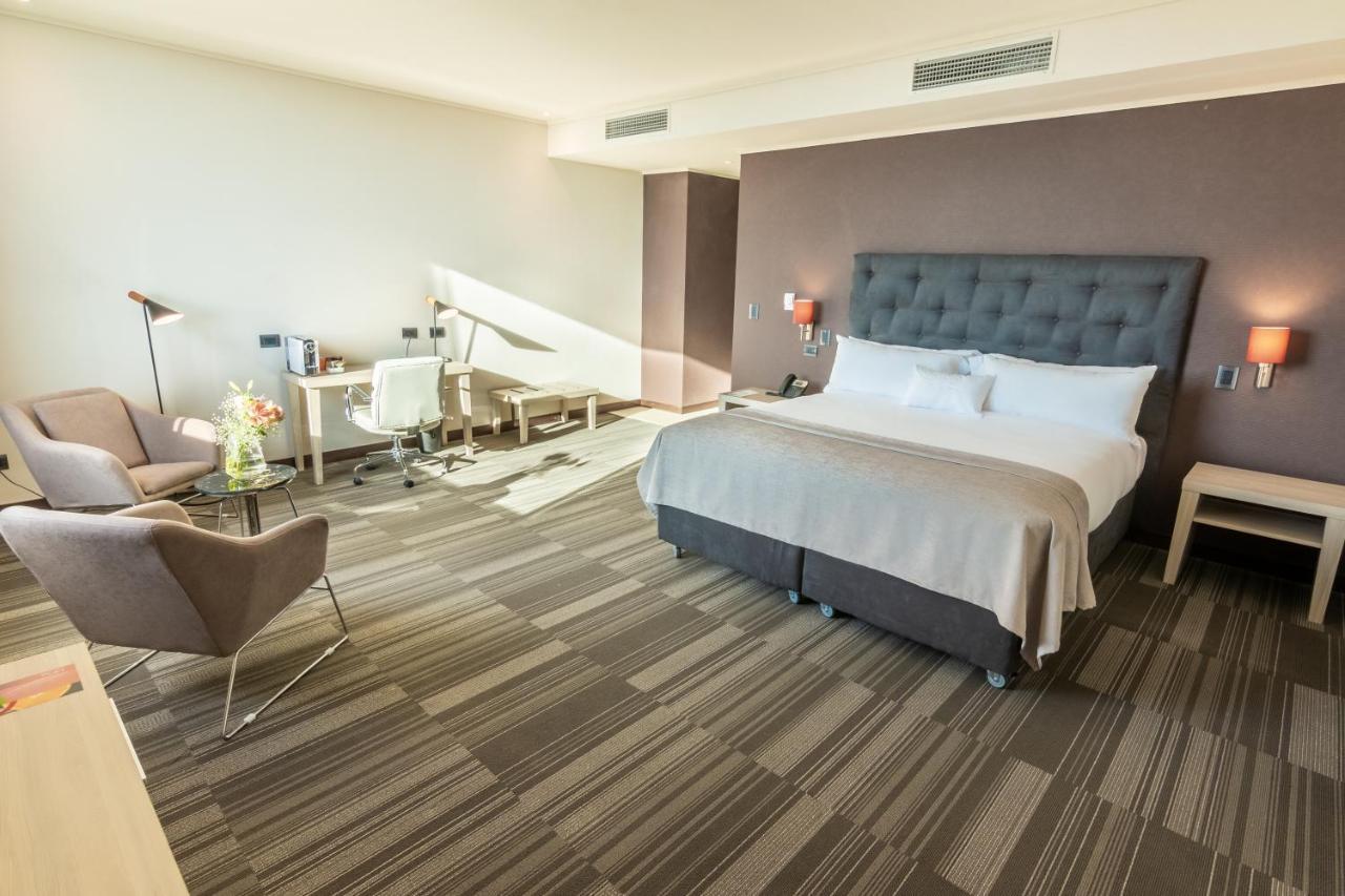 Mds Hotel Chillan Ngoại thất bức ảnh A room at the hotel